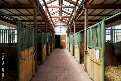 Konstfotografi Horizontal picture of empty clear horse stable without horses