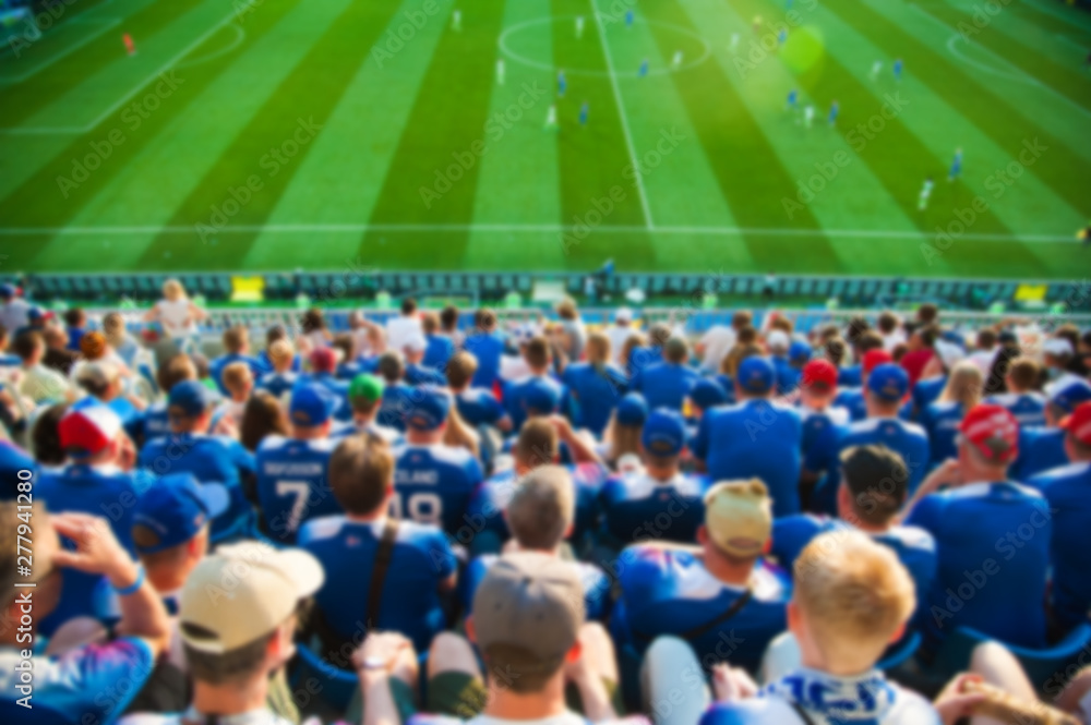 Naklejka premium Blurred crowd of spectators on a stadium