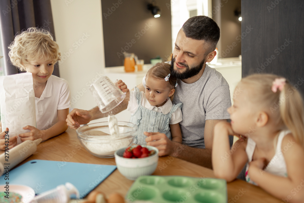 Nice cute girl sitting on her fathers laps Nice cute girl sitting on her fathers laps