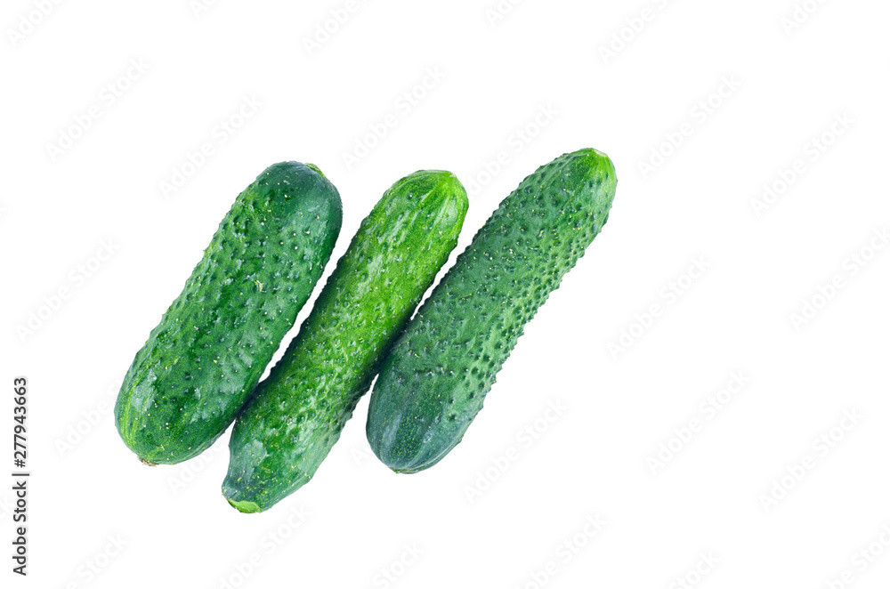 Fresh cucumbers isolated on white background. The view from the top. Background of organic food. Fresh cucumbers isolated on white background. The view from the top. Background of organic food.
