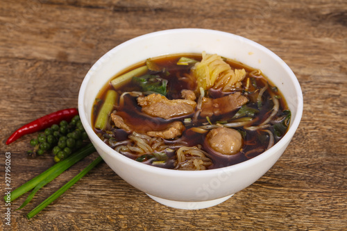 Thai style soup with meat and mushrooms © Andrei Starostin