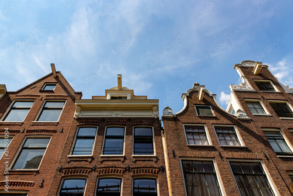Fototapeta premium Typical amsterdam houses with gabled roofs