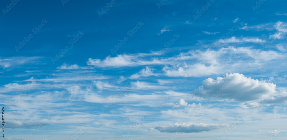 Deep blue sky background with beautiful white clouds