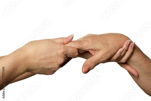 Woman holding adult daughters hands on white background