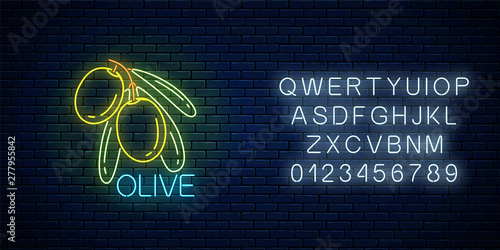 Glowing neon sign of olive branch with leaves with alphabet. Natural organic food symbol with green olives.