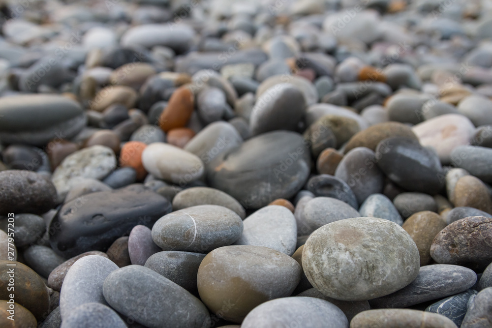 Abstract background with stones. Pebbles, coast. Abstract background with stones. Abstract background with stones. Pebbles, coast. Abstract background with stones.