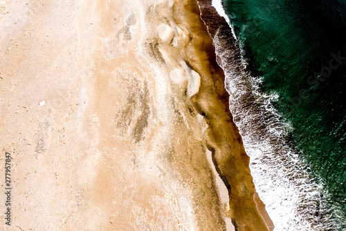 Aerial view of deserted beach and shoreline in Japan photo
