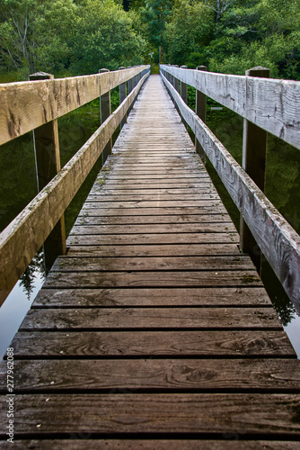 wooden bridge over the lake, river