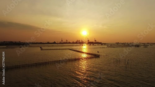 aerial view sunset Tanjung Emas Harbour , Tambak Lorok Vilages Semarang Central Java Indonesia photo