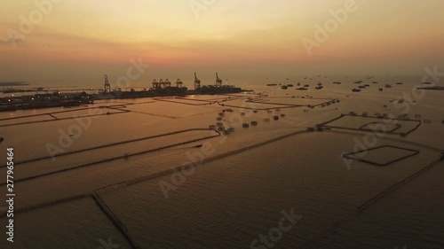 aerial view sunset Tanjung Emas Harbour , Tambak Lorok Vilages Semarang Central Java Indonesia photo