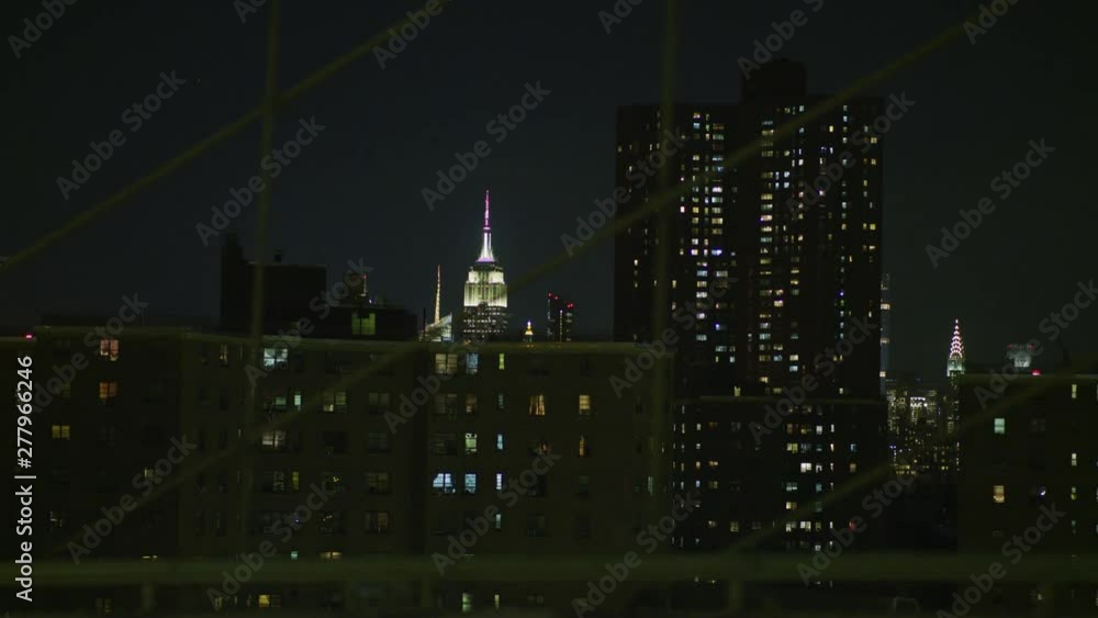 Empire State Building seen from Brooklyn Bridge, New Yprk City, at night Empire State Building seen from Brooklyn Bridge, New Yprk City, at night