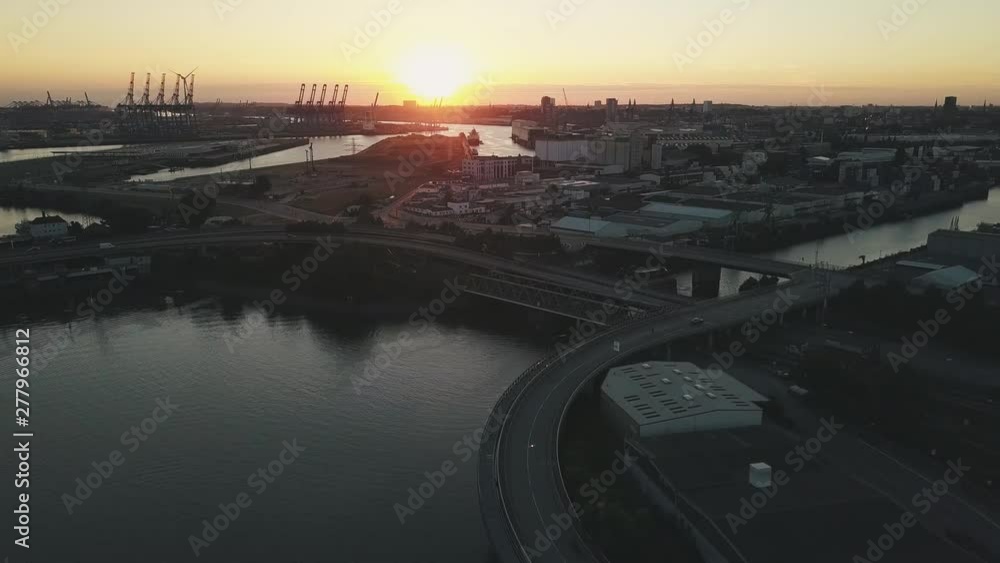 Aerial view Hamburg harbor with cranes at sunset Germany in 4k Aerial view Hamburg harbor with cranes at sunset Germany in 4k