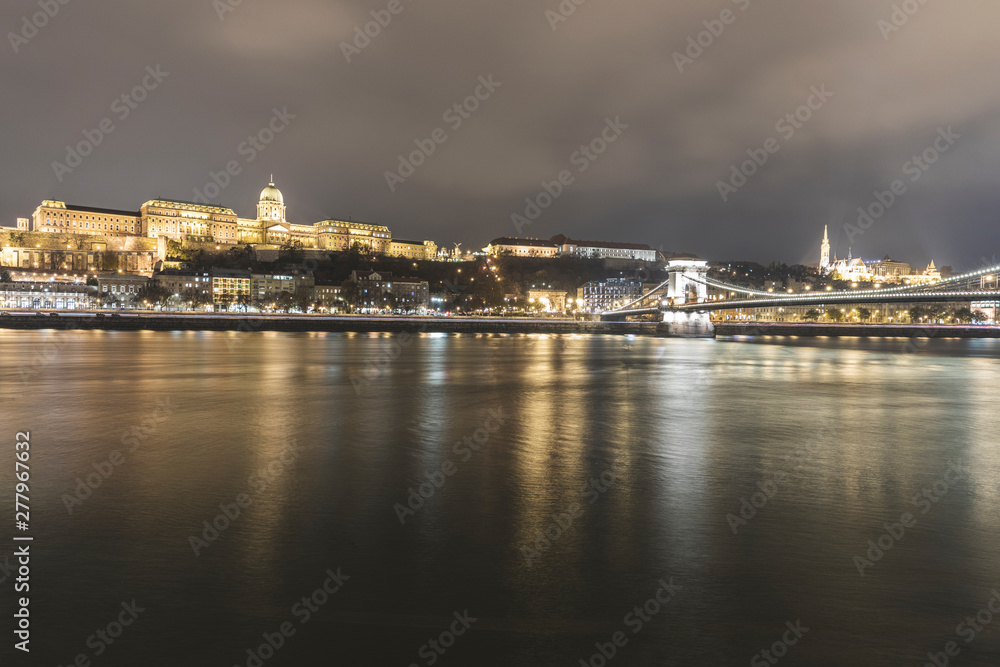 Danube river, Buda castle and Chain bridge at night, Budapest, Hungary Danube river, Buda castle and Chain bridge at night, Budapest, Hungary