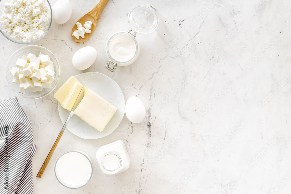 Breakfast on farm with dairy products on marble background top view space for text Breakfast on farm with dairy products on marble background top view space for text
