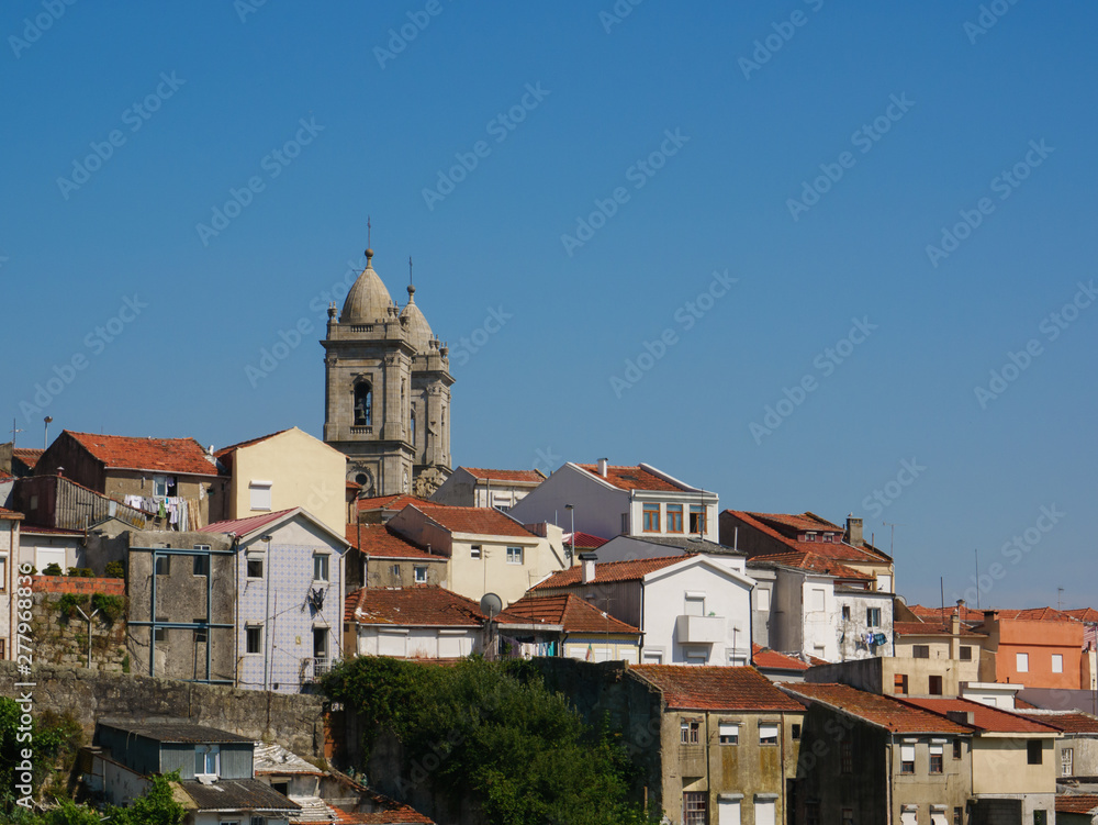 Cityscape view of Lapa area in Porto, Portugal with typical Portuguese architecture and spires of Lapa Church on horizon