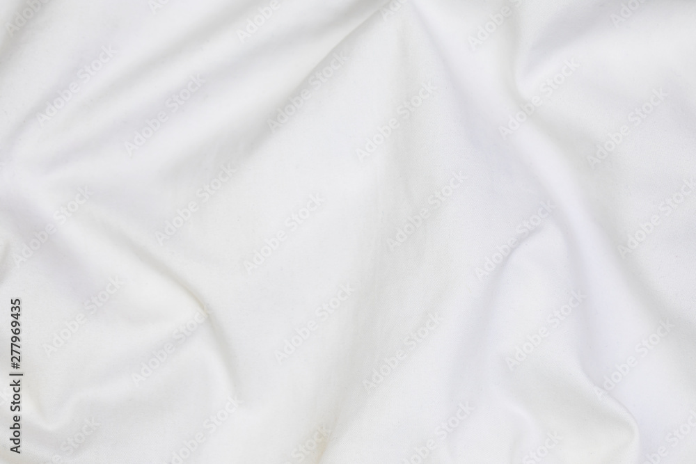 Close up of white bedding sheets soft focus and copy space