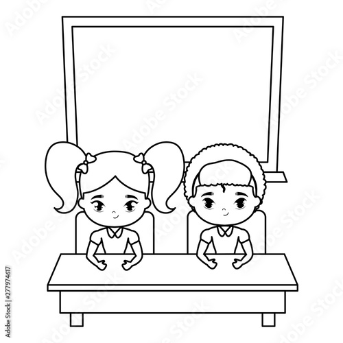 cute little students in desk with board school