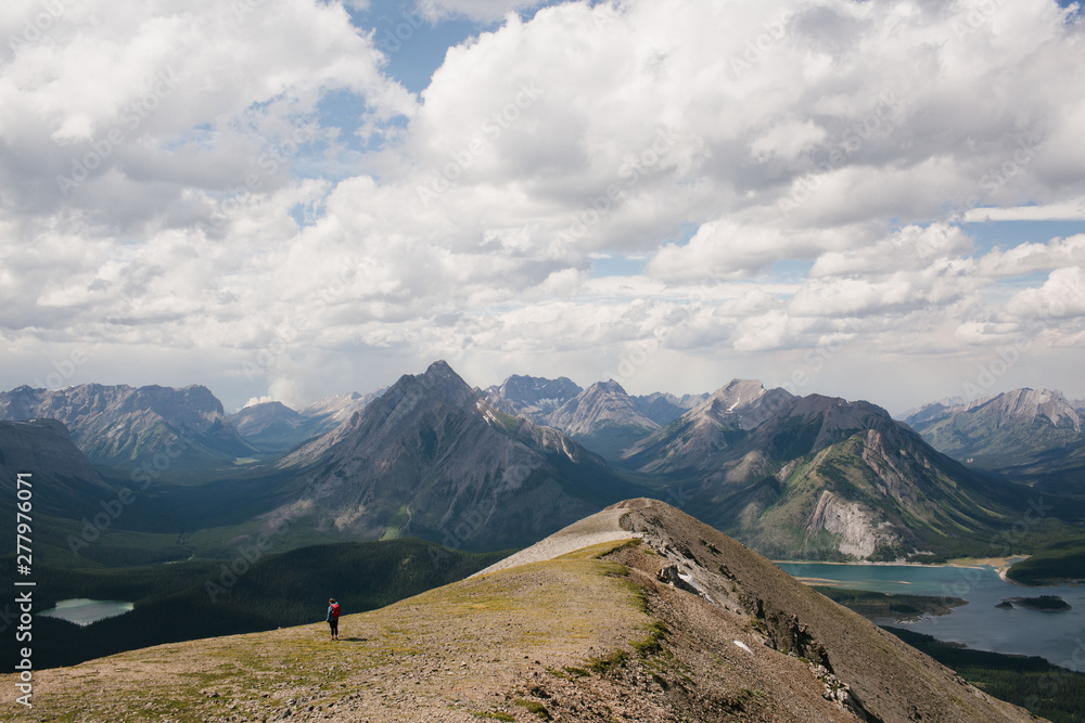 Girl against mountain backdrop, Canada