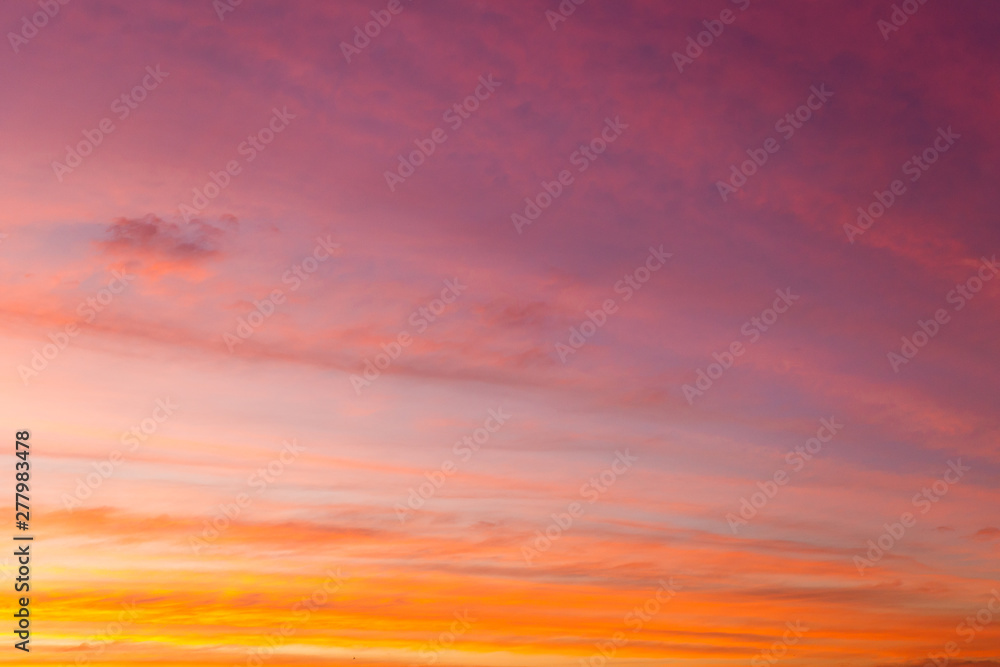 colorful dramatic sky with cloud at sunset.