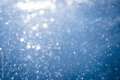 Abstract bokeh with blue background