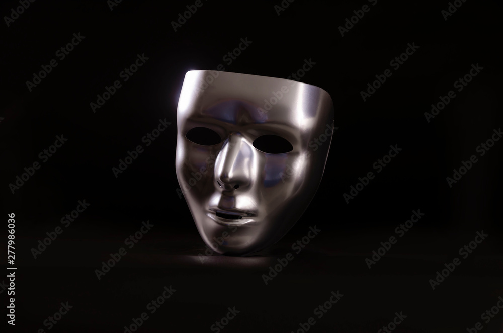 Naklejka premium Chrome mask on black background