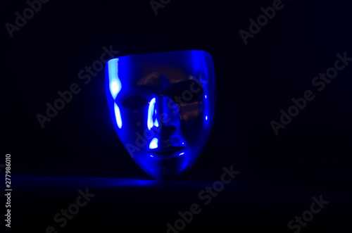 metal mask in blue light photo