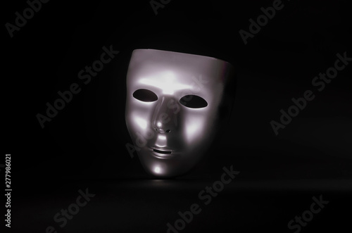 matte metal mask on black background © MedleyofPhotography