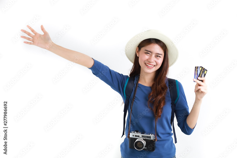 Travel with credit card concept : Asian woman in blue shirt and vintage camera happy and smile with credit card on white background Travel with credit card concept : Asian woman in blue shirt and vintage camera happy and smile with credit card on white background