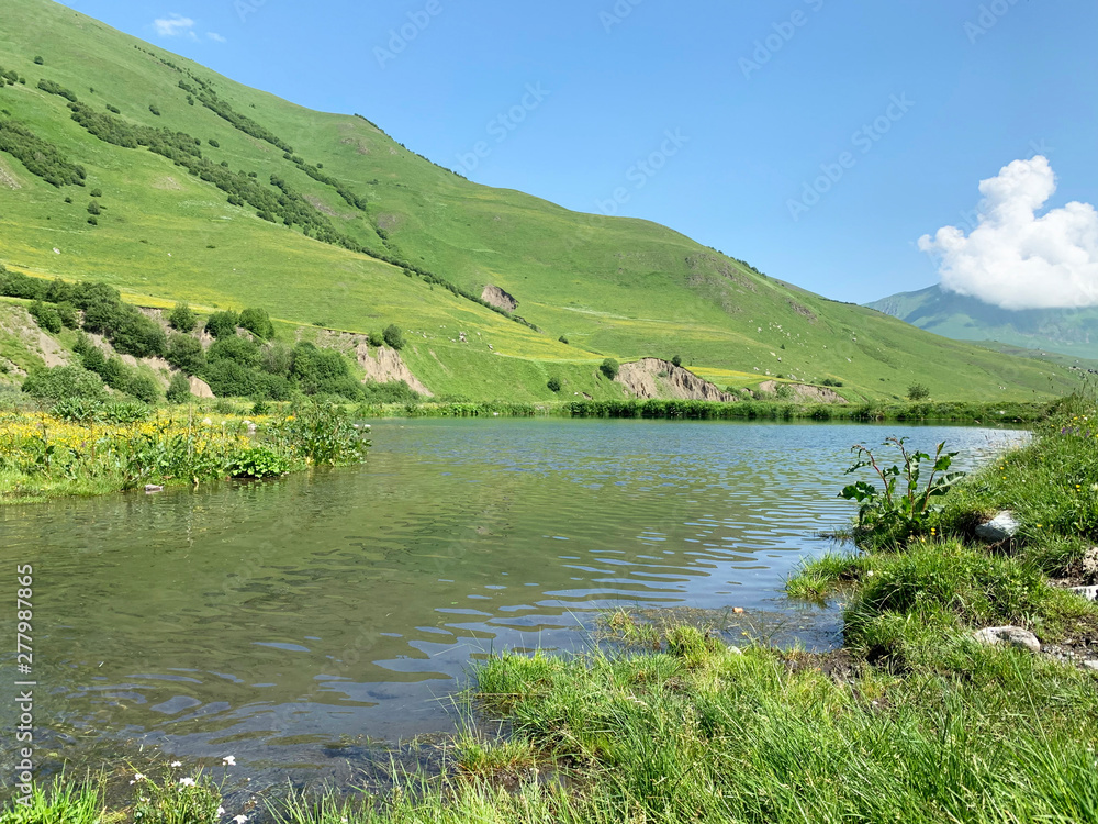 Midagrabinskoye lake in the mountains of North Ossetia in summer