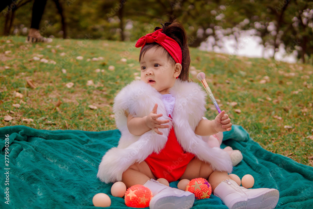 Happy little girl in autumn park. Fashion Kid outdoor. Happy little girl in autumn park. Fashion Kid outdoor.
