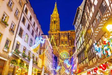 Festive Christmas illumination and decorations on streets of Strasbourg - capital of Christmas, Alsace, France.