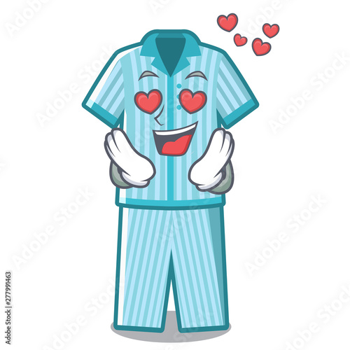 In love pyjamas placed on a cartoon bed