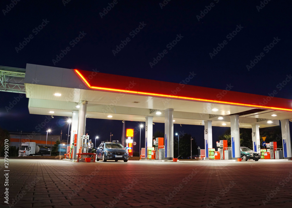 Petrol gas station at night with lights