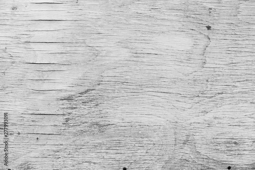 monochrome texture of old plywood. Background white peeled off plywood. Plywood cracked with age