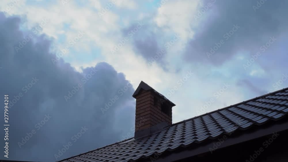 Time Lapse Of Clouds Over A Roof Of The House Time Lapse Of Clouds Over A Roof Of The House