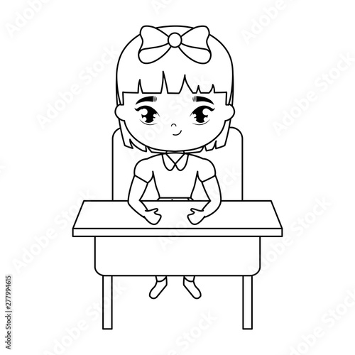 little student girl sitting in school desk