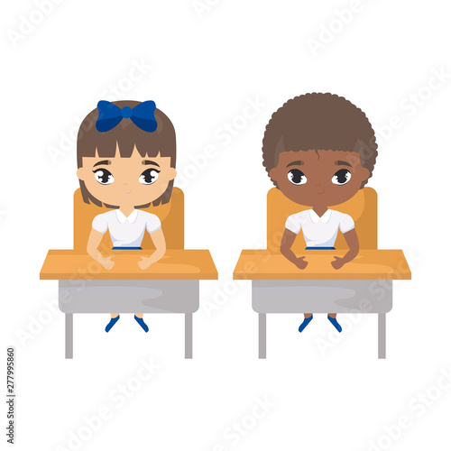 little students seated in school desks
