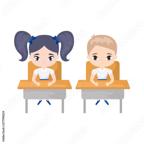 little students seated in school desks