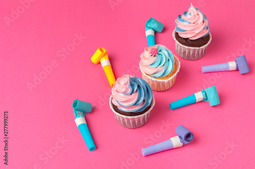 Tasty cupcakes closeup background with copy space. Birthday party sweets