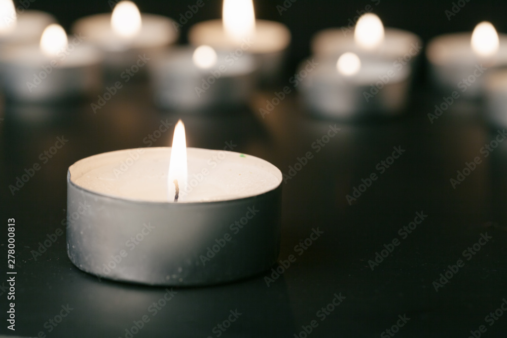 Candles Burning at Night. White Candles Burning in the Dark Candles Burning at Night. White Candles Burning in the Dark