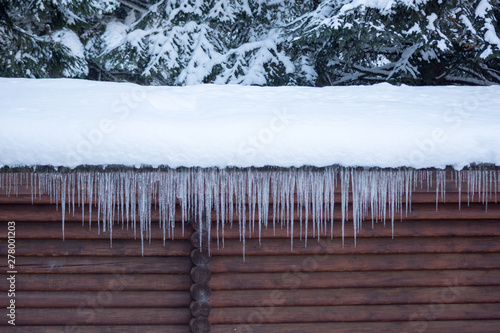 Icicles hanging from a rooftop