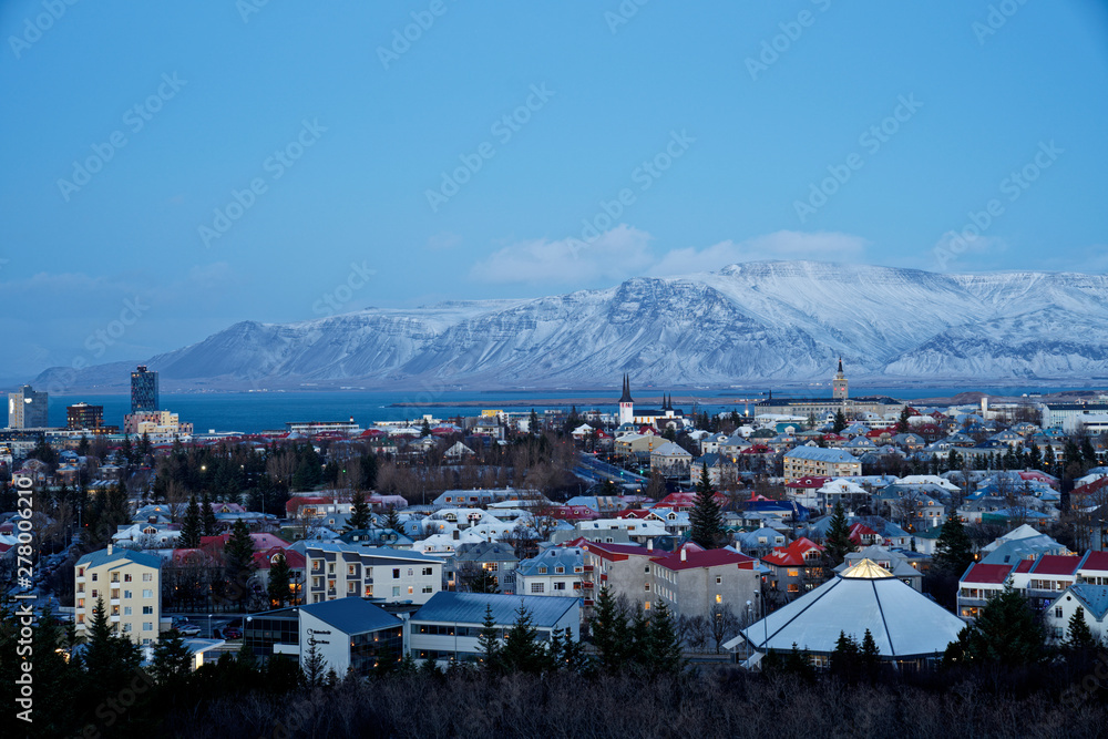 High Quality 120° Panorama of Reykjavik city after sunset during winter with snowcapped mountain view in the background from perlan (pic 4/7)
