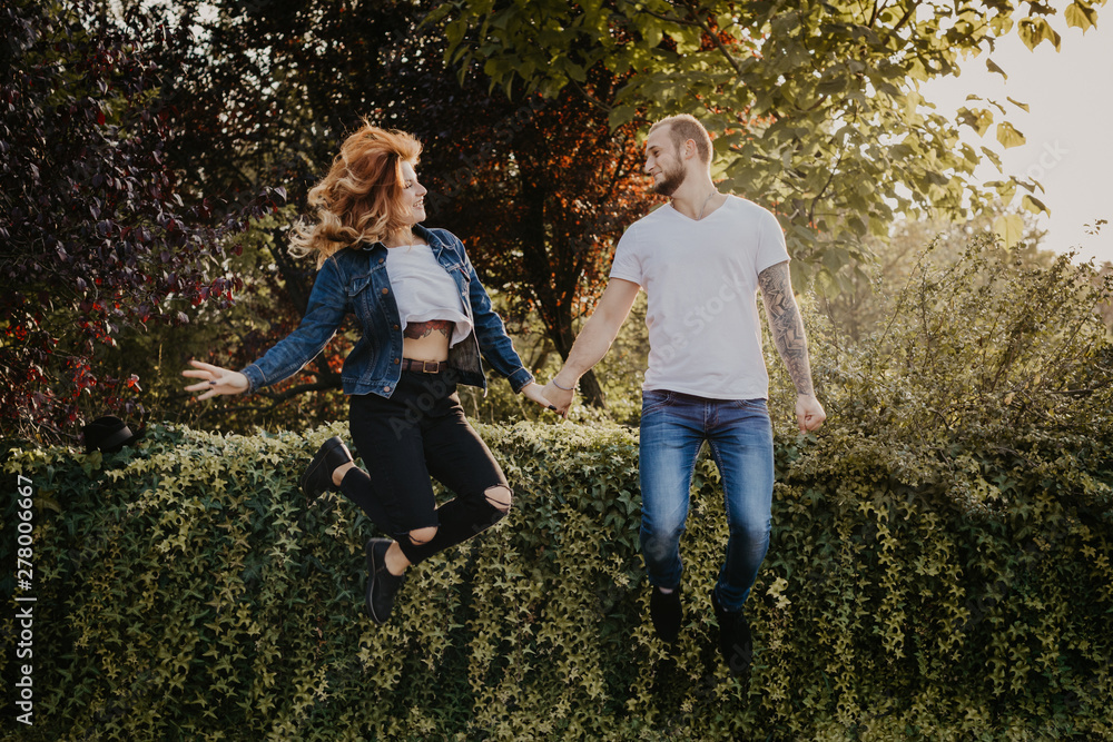 Fototapeta premium Happy loving couple outdoor in park .