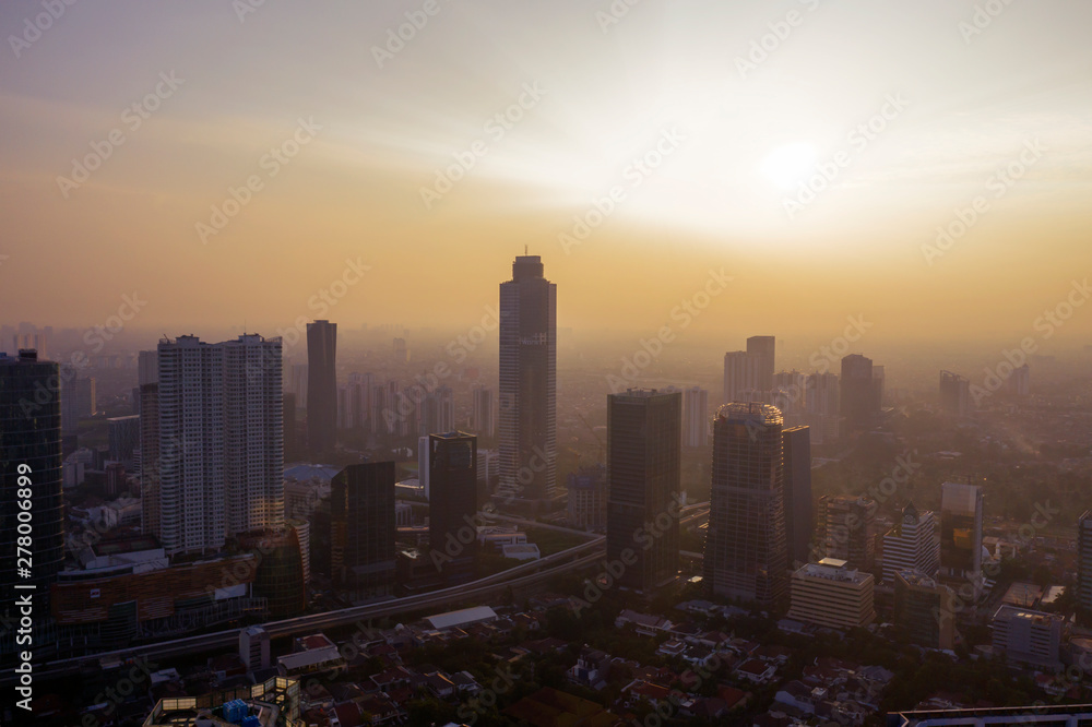 Jakarta cityscape with silhouette of skyscrapers
