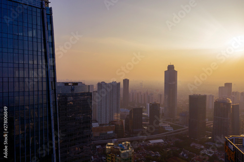 Jakarta cityscape with high buildings at dawn time © Creativa Images
