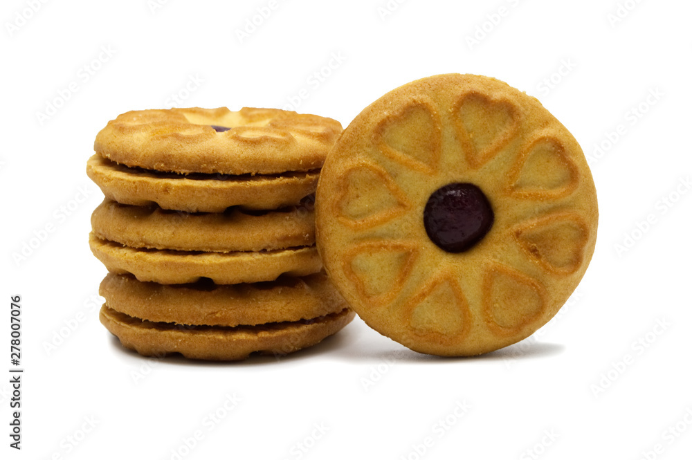 Biscuits cracker homemade. Sandwich cookies filled with a Blueberry jam and sweet  flavored. The circle has a heart around design. Isolated on white background.
