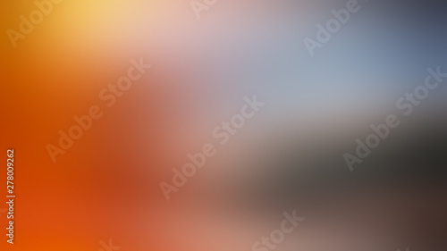 Abstract blurred gradient background. Orange, brown, blue.