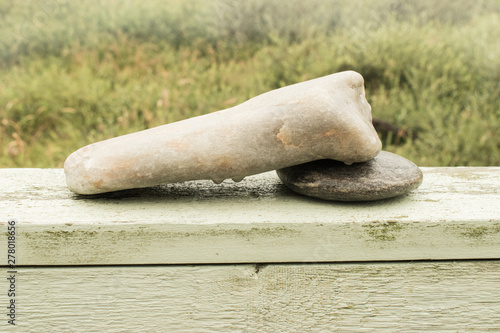 stones on wooden table photo