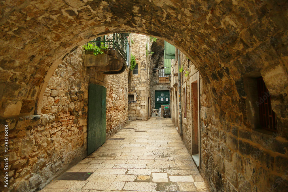 Historic street with tunnel made with stone, Split fortress, Croatia