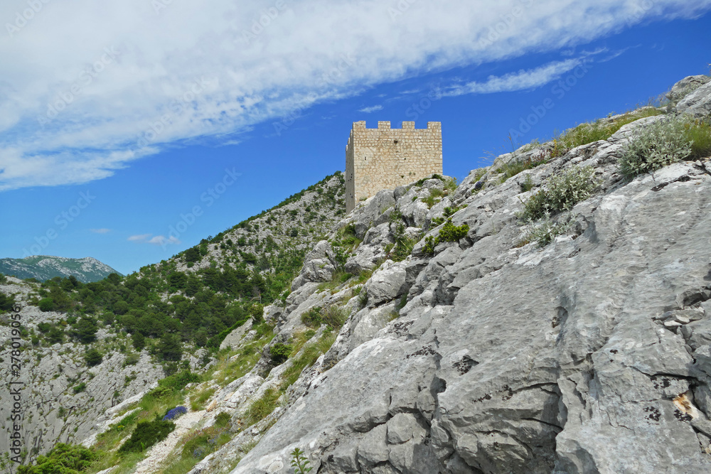 Historic fortress on the hill above Omis and Cetina River, Croatia